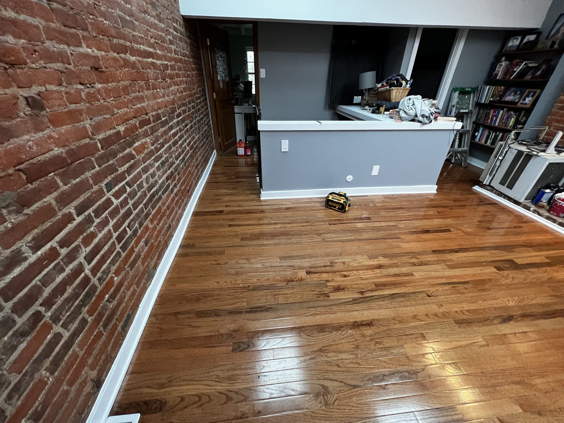 Hardwood flooring install in a Philadelphia residential hallway