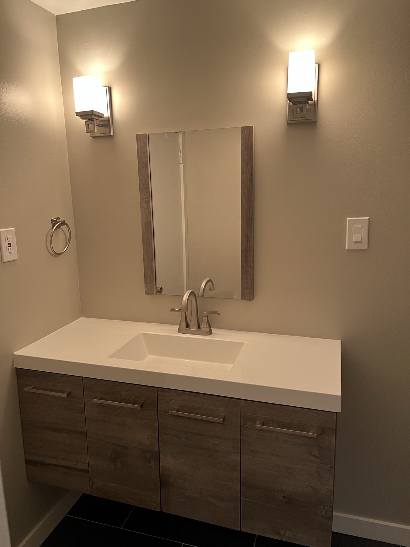Modern bathroom vanity install in Philadelphia by Martinez Osta Construction