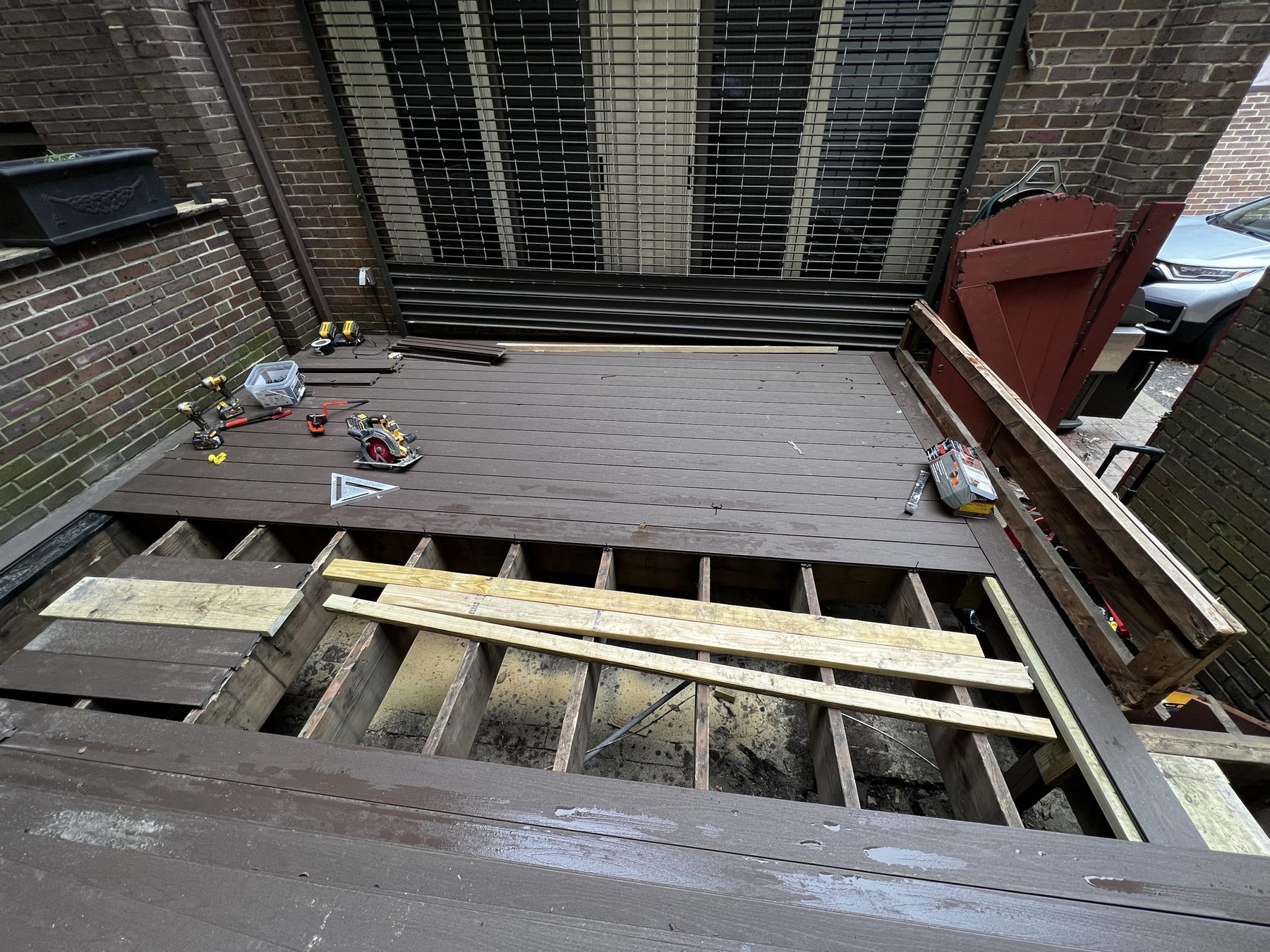 Backyard deck renovation in Philadelphia with custom railings